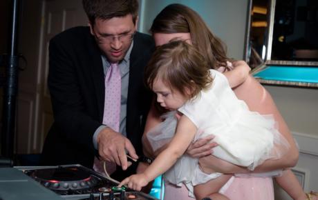 Wedding DJ interacting with the younger guests at Abenaqui Country Club - Rye NH. Photo by Rick Bouthiette Photography